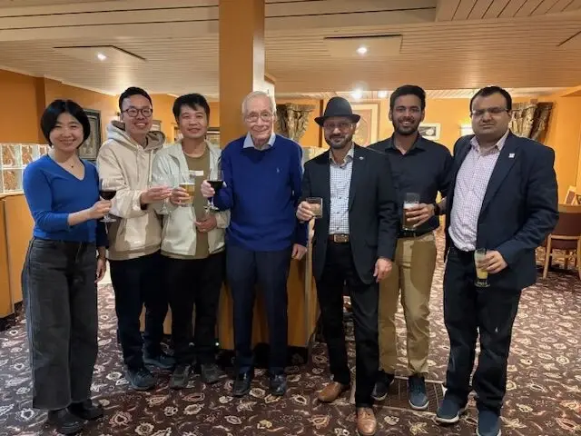 Professor Tony with Joe and attendees at a TiE Ottawa community event.